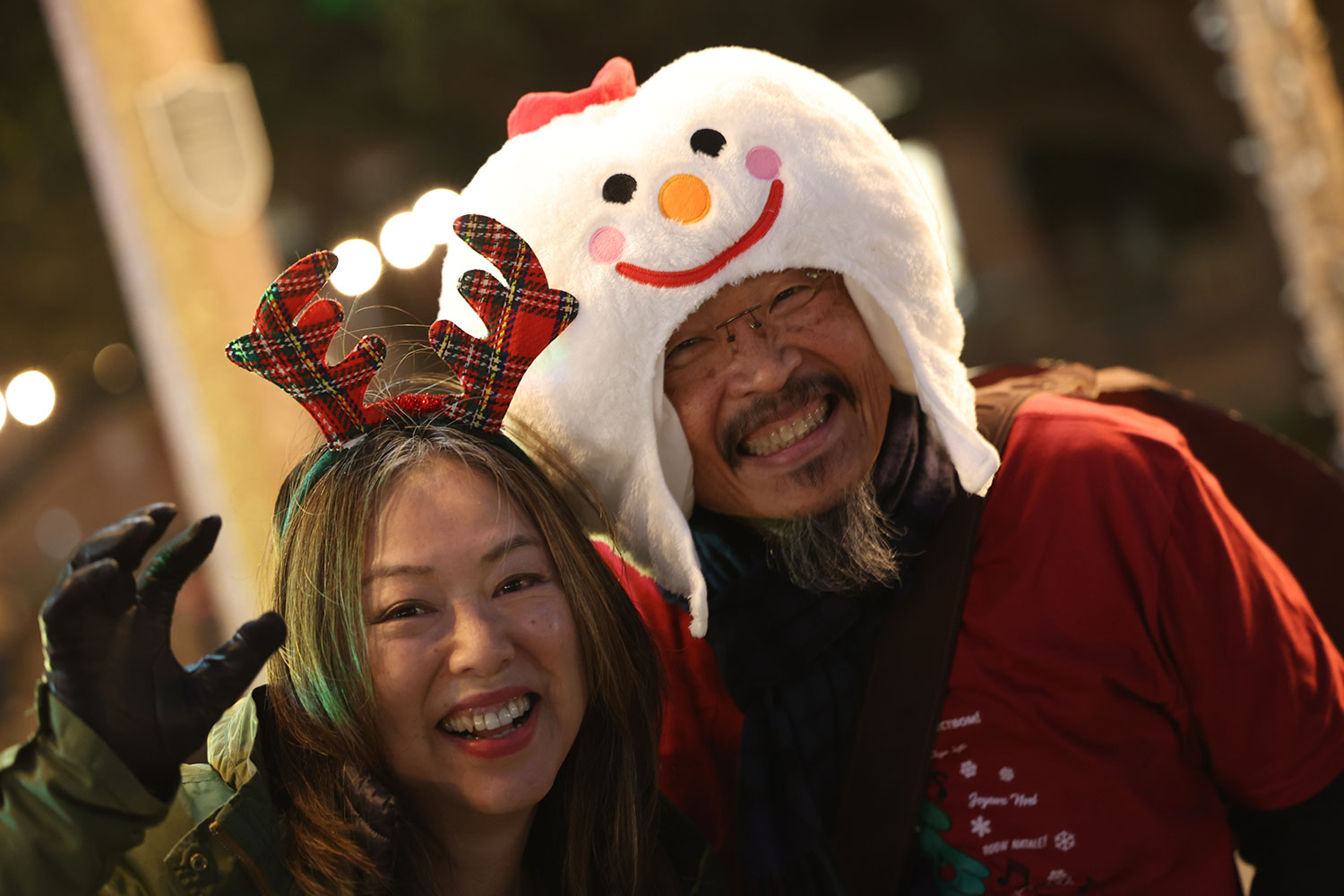 A couple dressed for Christmas fun